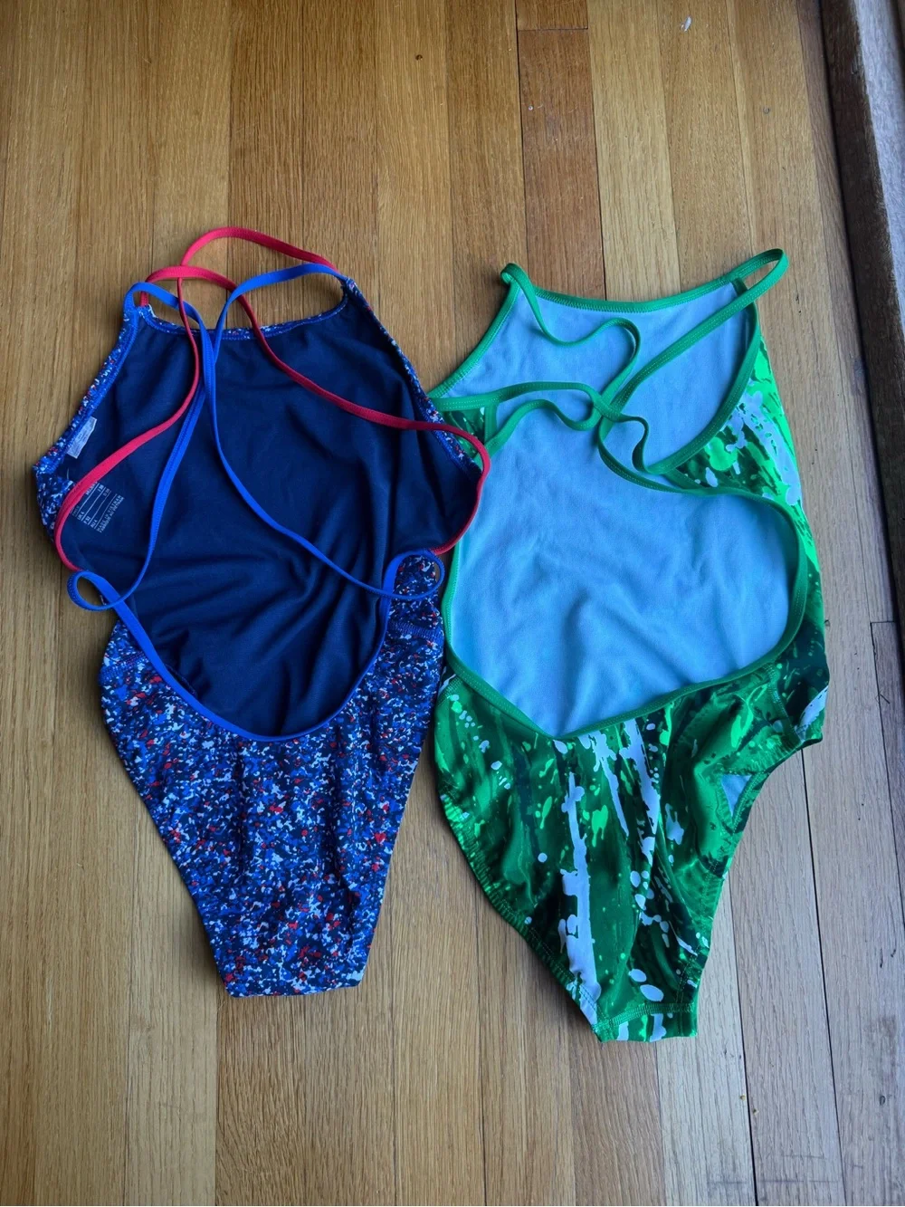 Two Nike Performance Swimsuits